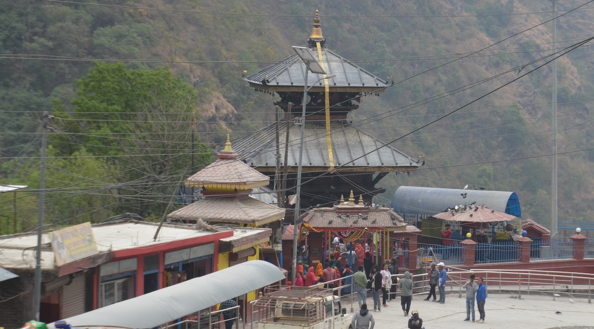 Panoramic sunset view from Supa Deurali Temple overlooking Mahabharat mountain range valleys